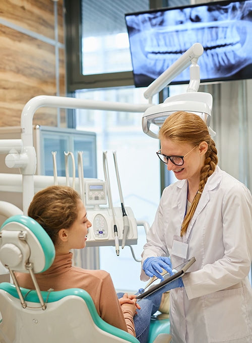 Dentist showing the results