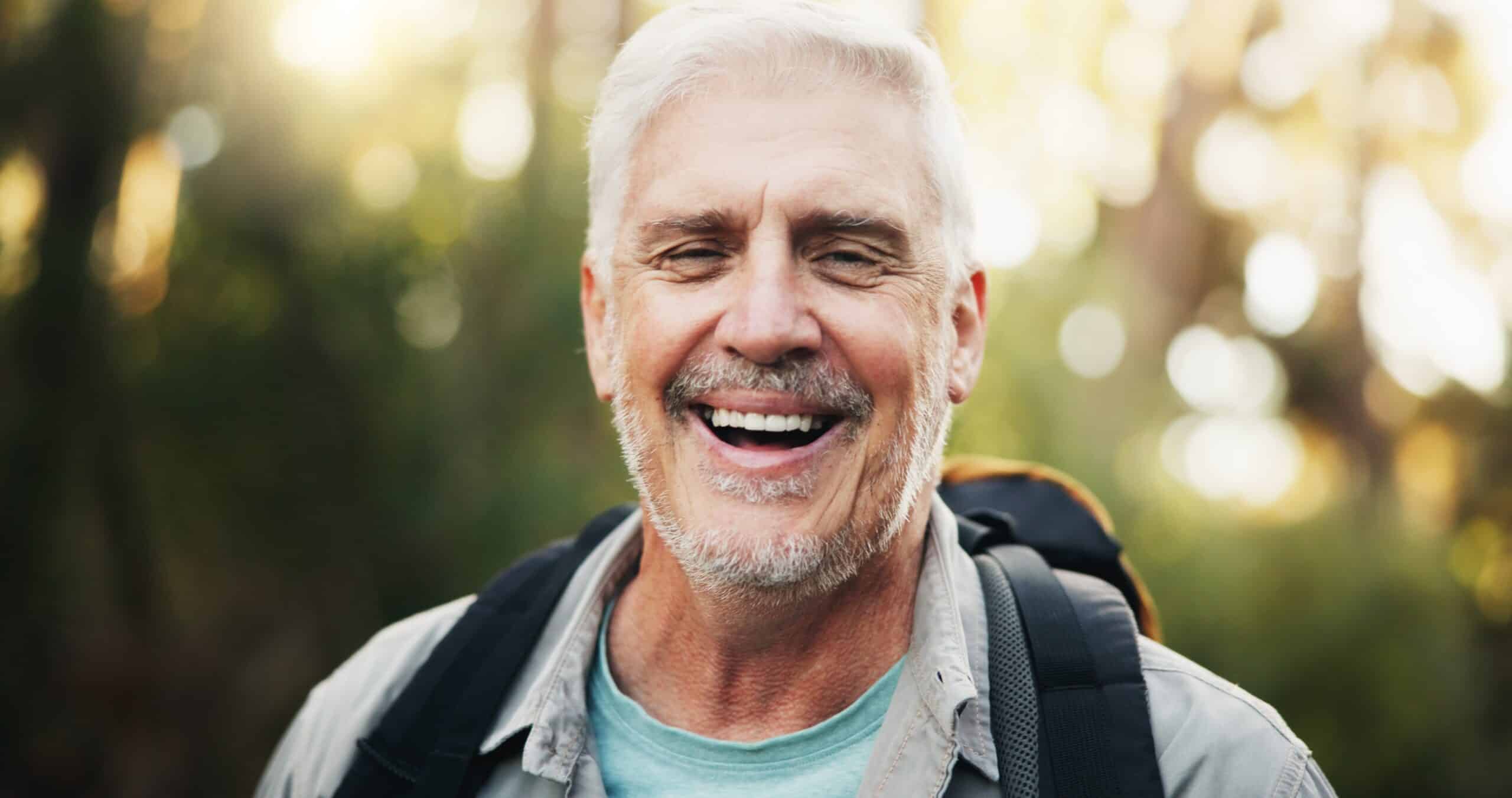 Portrait,,Hiking,And,Senior,Man,In,Forest,,Journey,And,Happy
